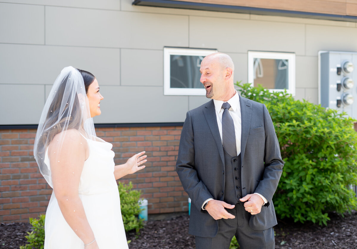 emotional first look between bride and father intimate wedding in Cleveland