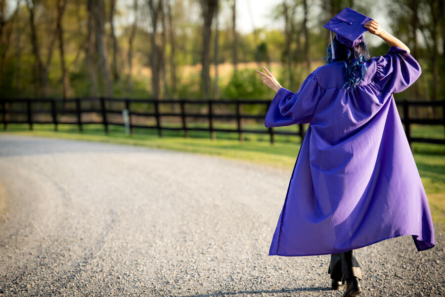 senior girl peace out cap and gown