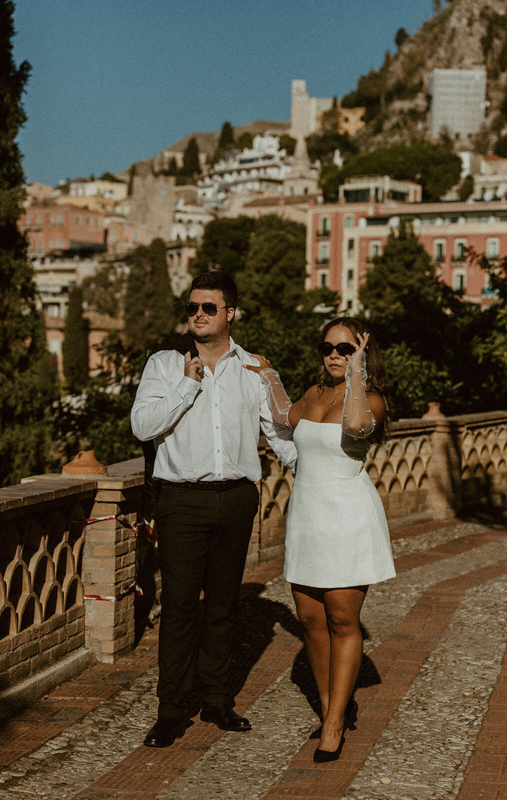 editorial couple poses in taormina italy