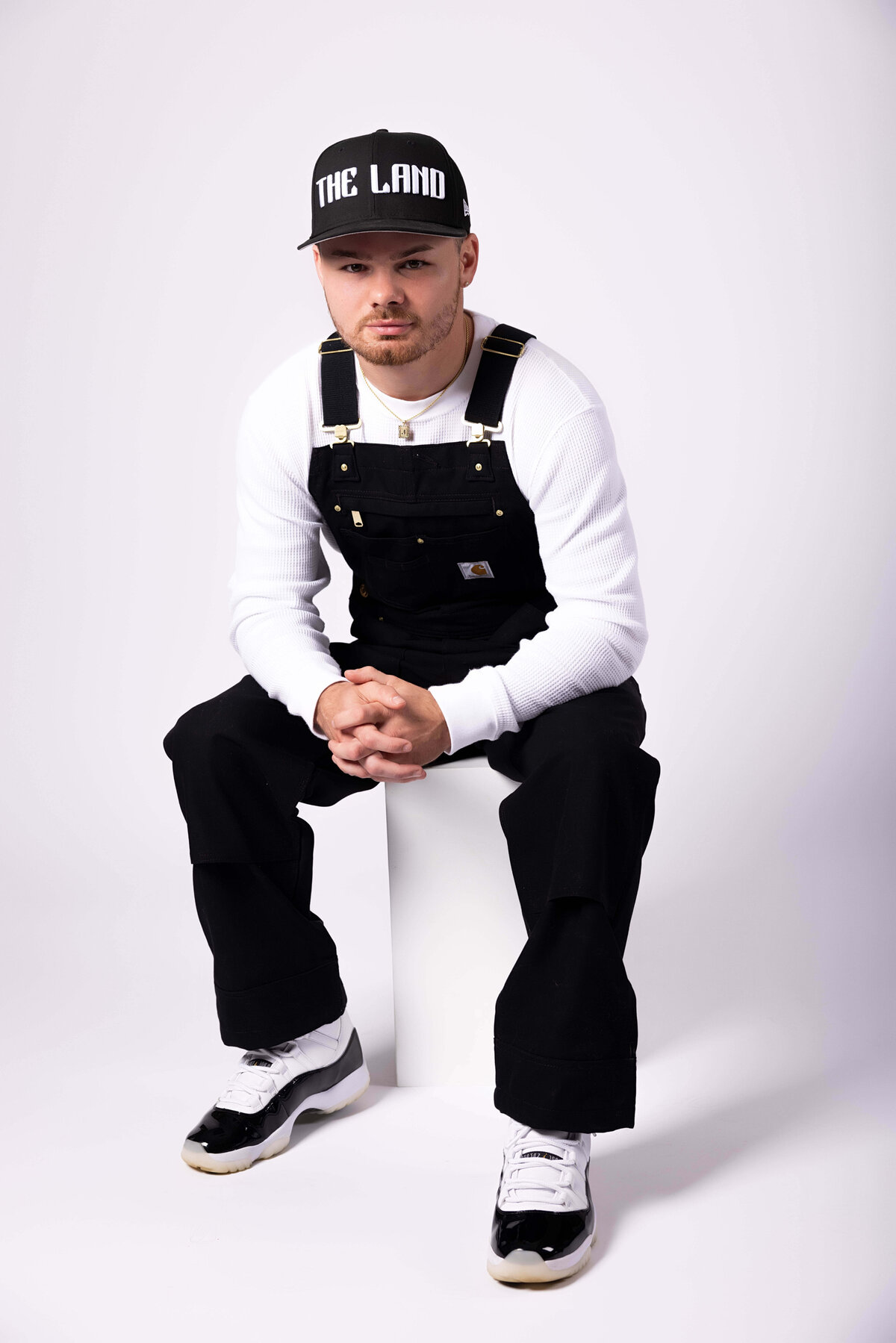 Professional boxer sitting on a box in birthday session with Reva Davis photography