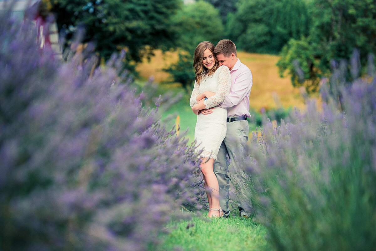 couple hugging in lavender