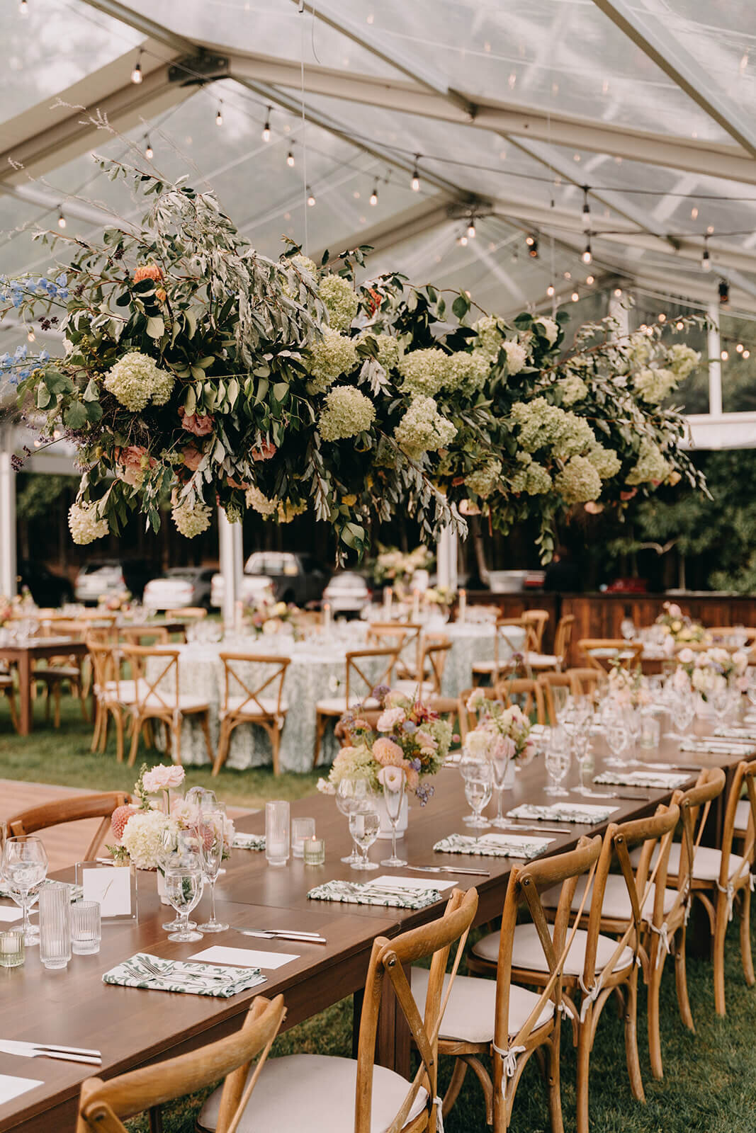64.hanging-floral-installation-clear-tent-wedding-green-and-white-decor.