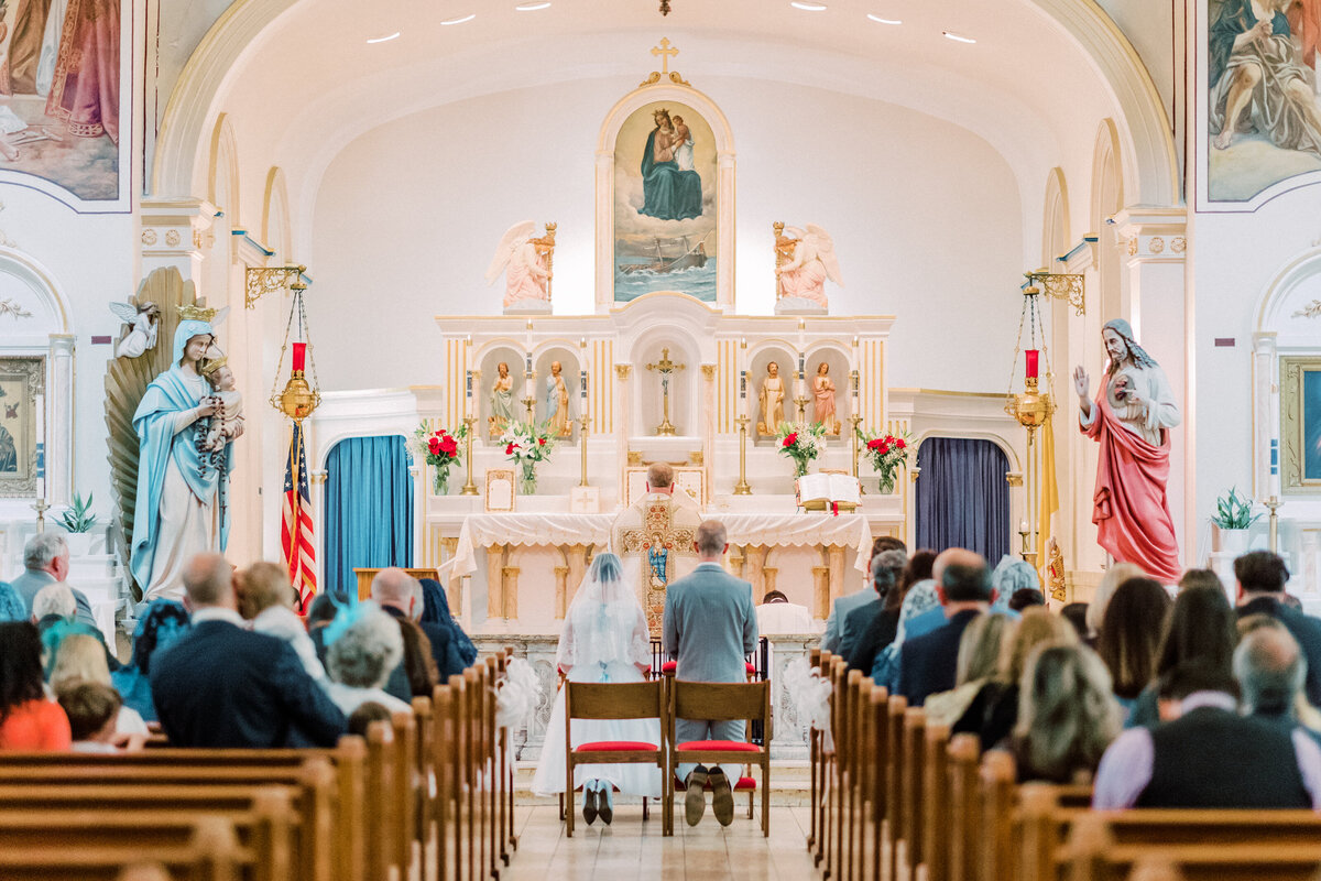 Liturgy of the Eucharist at traditional Latin Mass wedding at Our Lady Help Christians in Buffalo