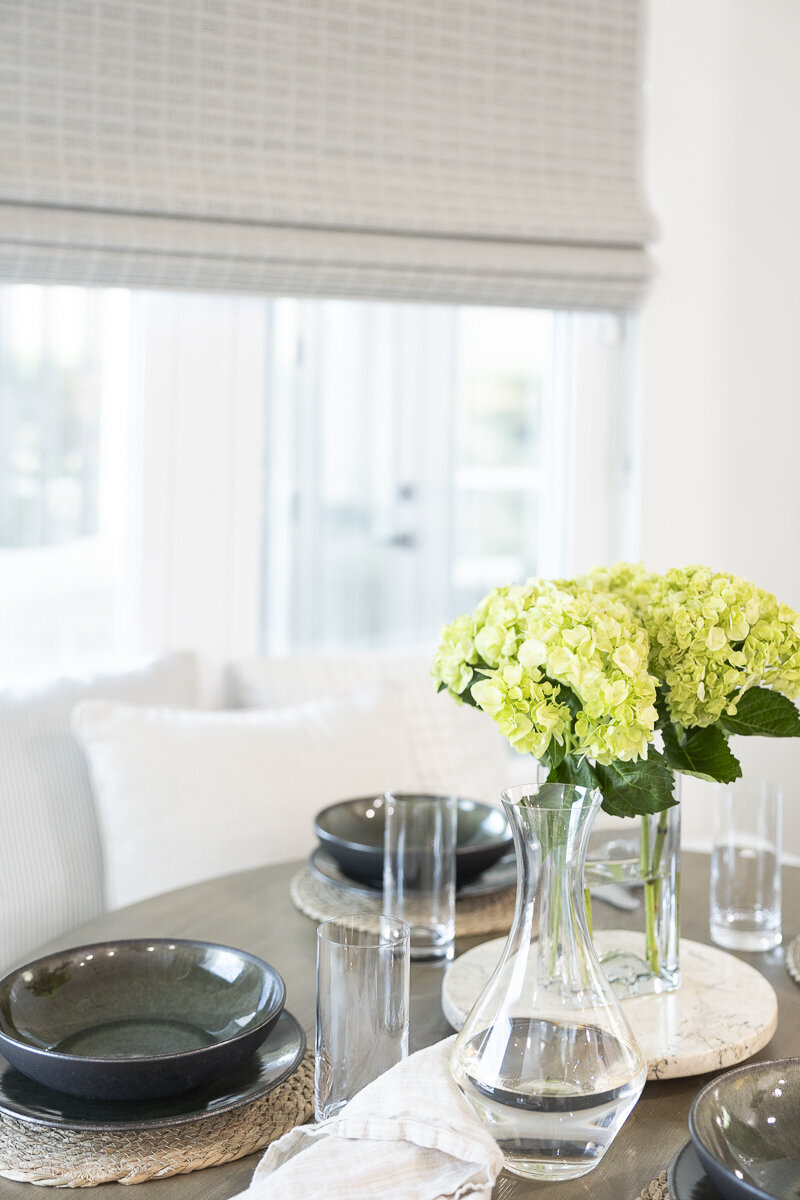 dewine design orlando interior designer belle isle yellow flowers on dining room table 