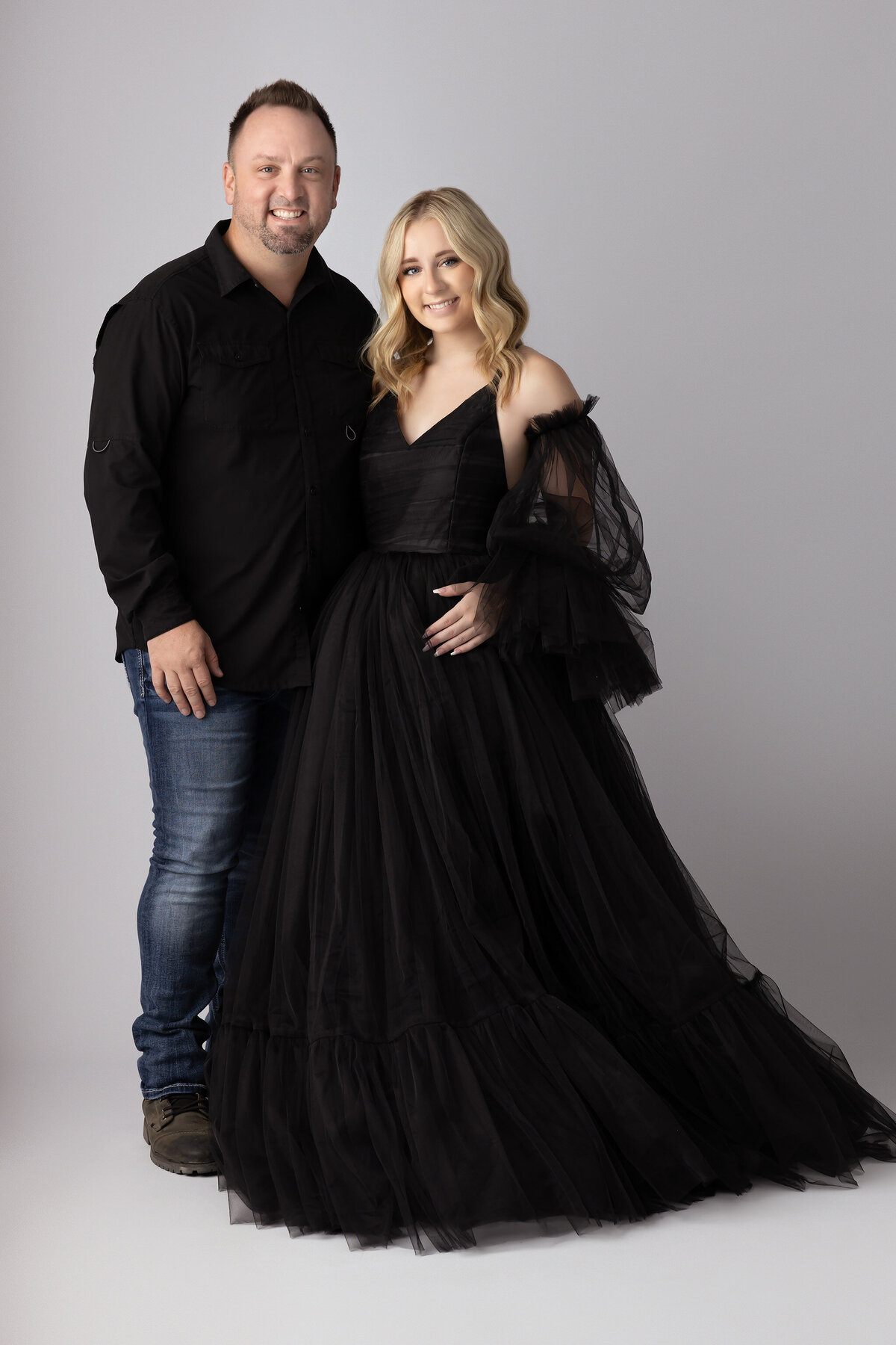 Father and daughter in black formal wear, captured by a Dallas family photographer.