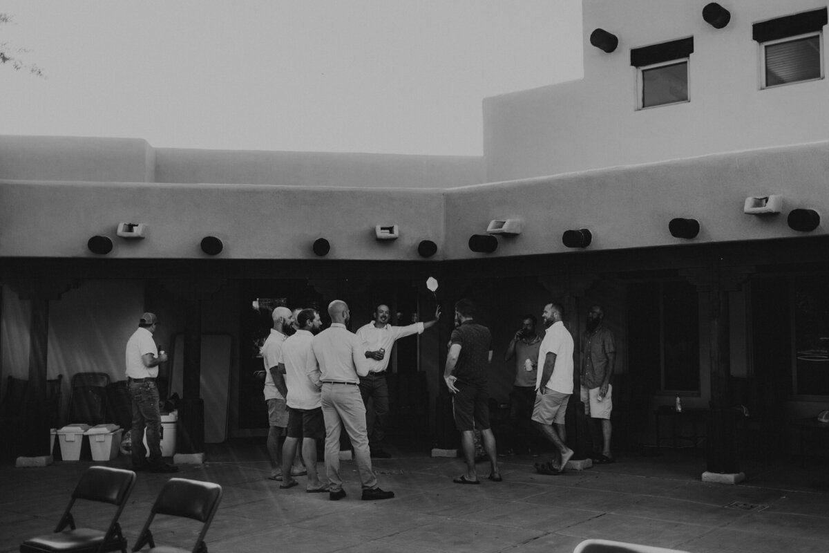 groom with his friends hanging out before the ceremony