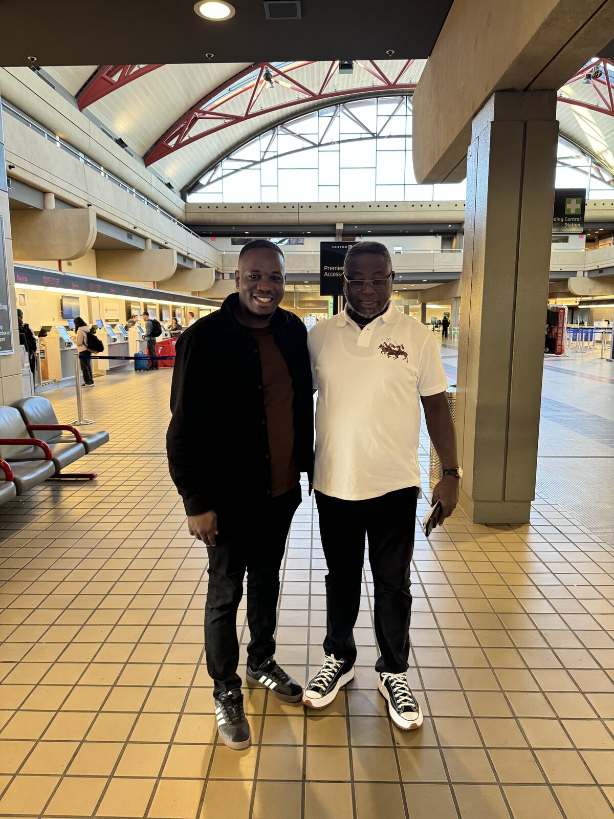 Ev. Augustine Mpemba Jr. with Pastor Matthew Ashimolowo