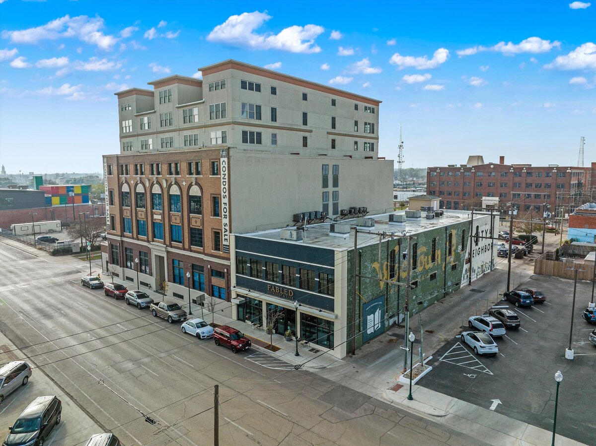 Street view of the historic Behrens Loft building that holds this one-bedroom, one-bathroom loft vacation rental condo with high speed WiFi, fully stocked kitchen, and room for four guests in downtown Waco, TX.