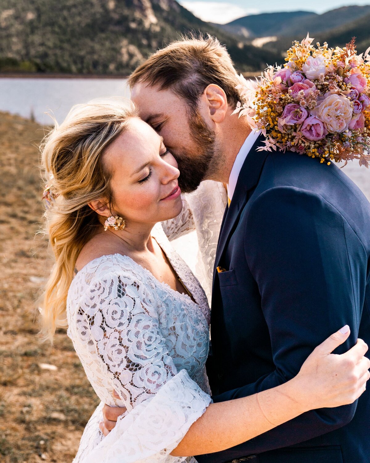 denver colorado wedding photographer - man kissing woman's cheek