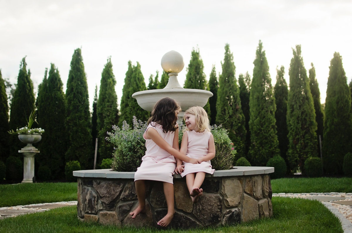 Lifestyle portrait session of sisters at a country club taken by Sarah Alice Photography in Northern Virginia