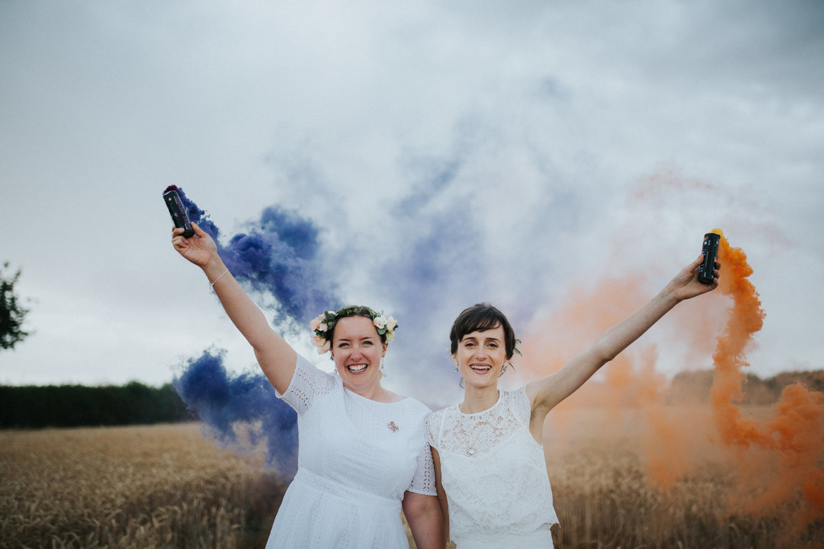 Lesbian wedding in Warwickshire with smoke bombs