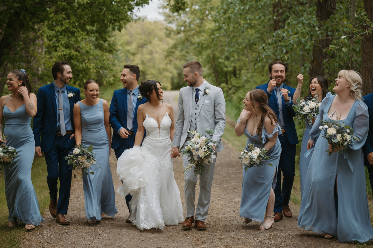 bridal party walking through venue on wedding day