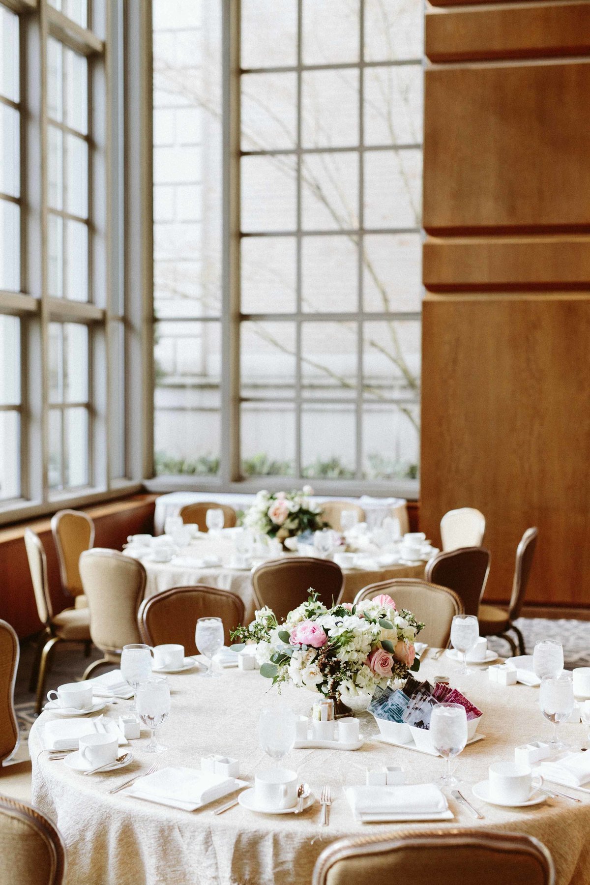 round guest tables at baby girls first birthday party