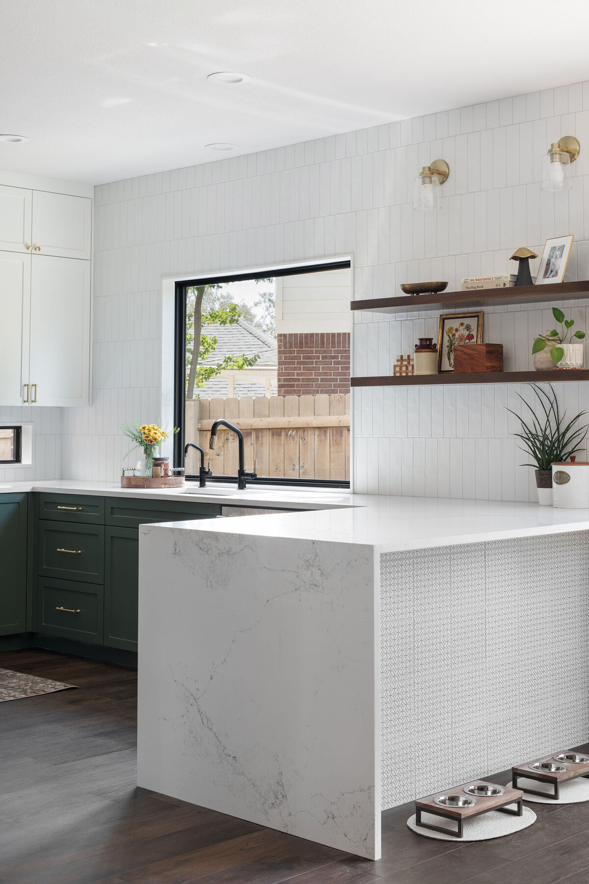 hello-home-austin-waterfall-peninsula-two-tone-kitchen-remodel-tile-on-peninsula-green-cabinets-tile-to-ceiling-4
