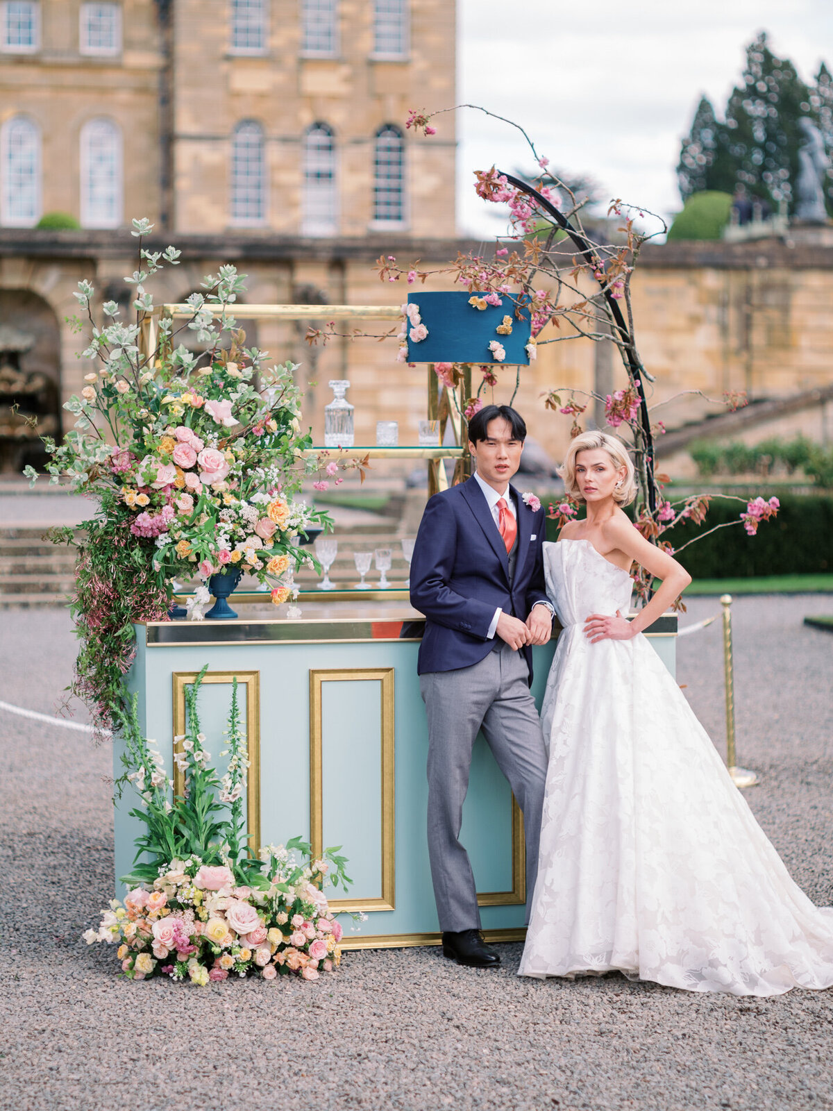 bride and groom at the bar at blenheim palace