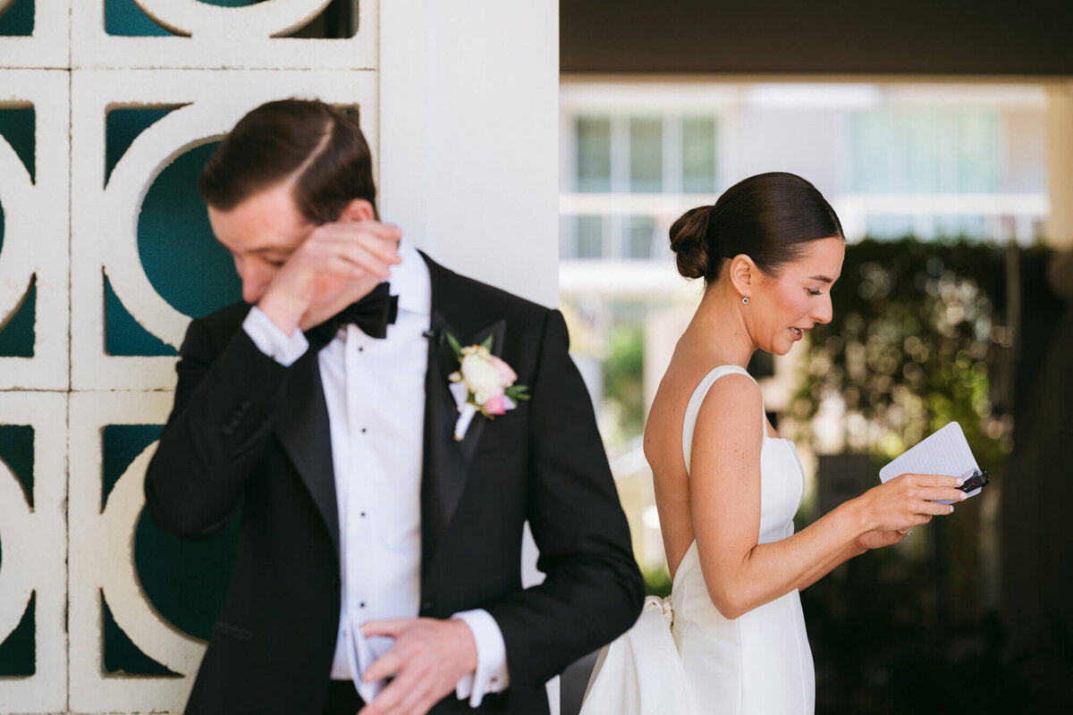 Bride and groom share emotional letters before their first look at Mountain Shadows, captured by an AZ wedding photographer.