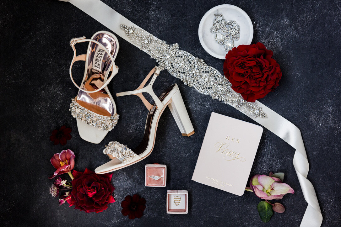 gold accents, sparkles, belt, champagne shoes, red roses, mauve, vow book, her vows