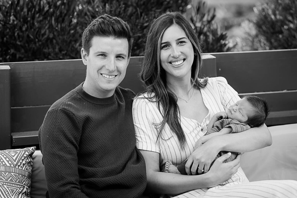 KS-Gray-Photography-family-portraits-in-orange-county-couple-holding-newborn-baby