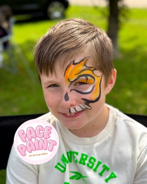 face-painting-by-alyssa-daken-boys-flaming-skull-cool-face-paint-design