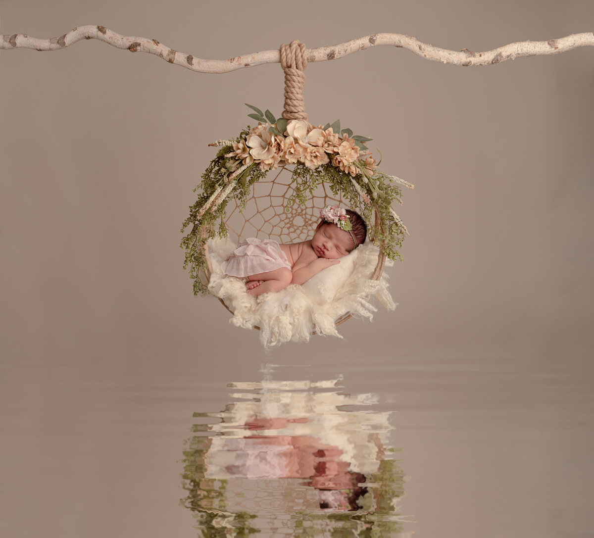 baby in hammock for newborn photography in orlando
