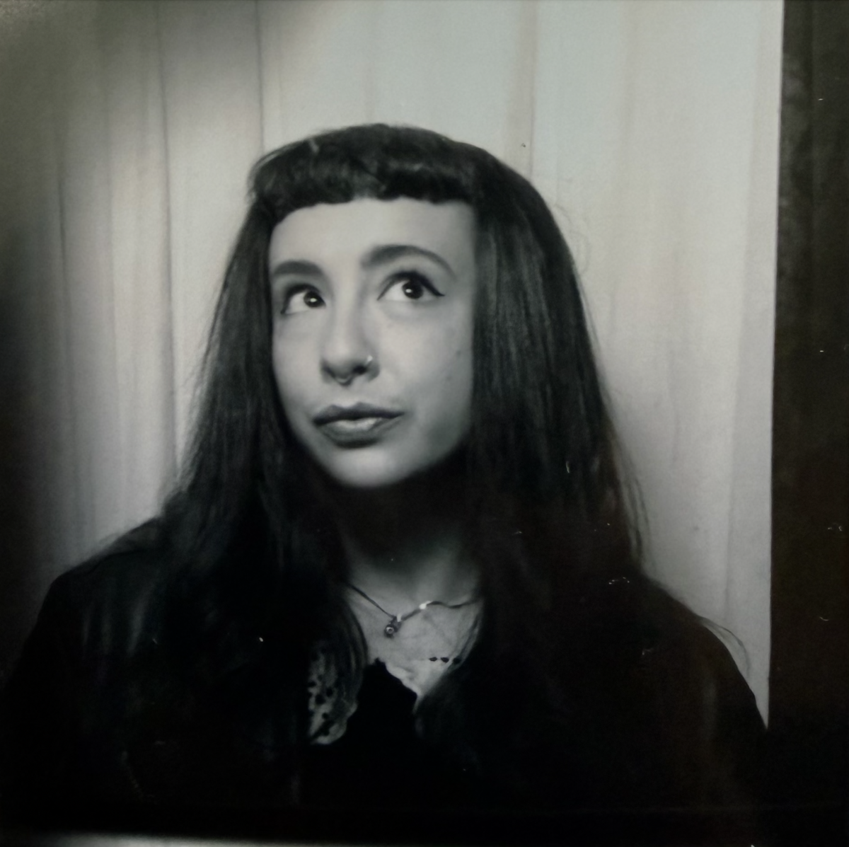 Portrait of photographer Ashley Joyce taken in a photo booth at the Ace Hotel in NYC