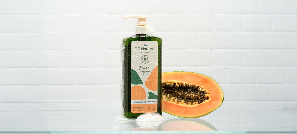Group image of packaging design for body wash range for OC Naturals with bright abstract shapes in background