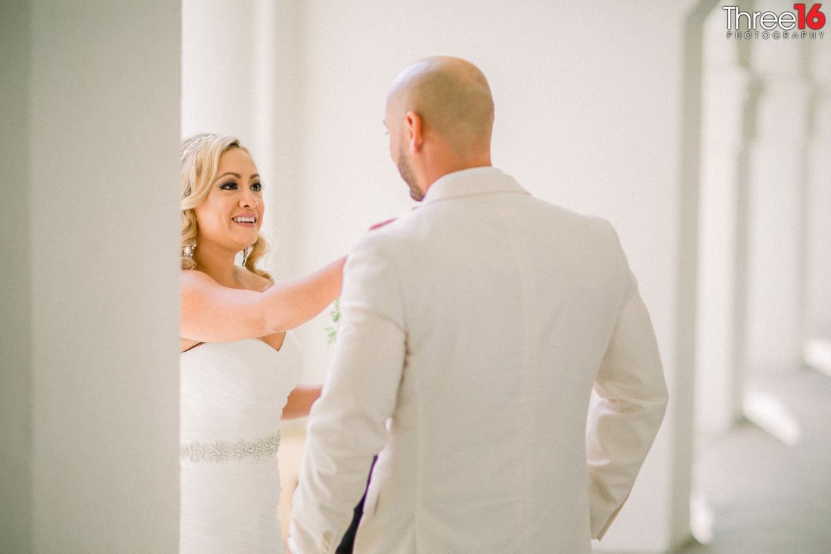 Bride shares a smile with her groom