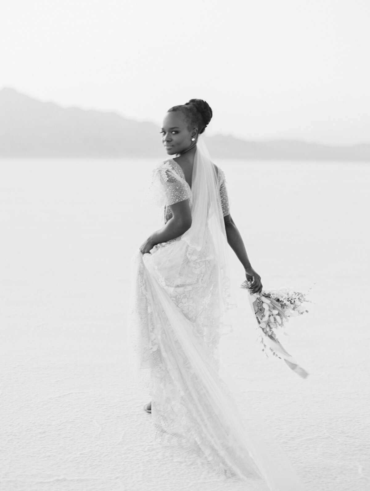 Bride walking away photographed by Chicago editorial wedding photographer Arielle Peters