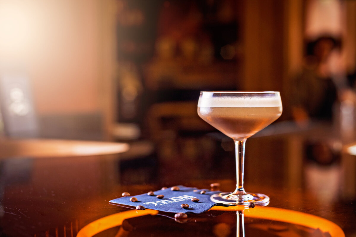Advertising photograph of a high end cocktail in a bar