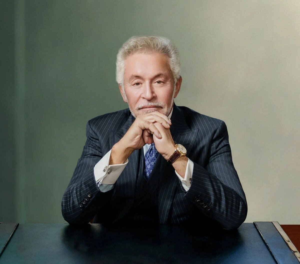 NYC corporate headshot of young professional man in modern office environment