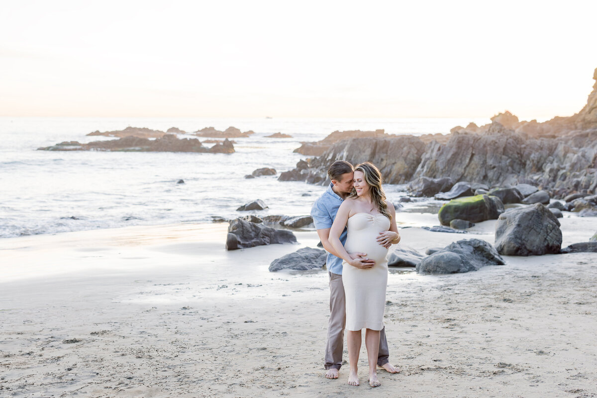 bright and airy maternity photo at the beach