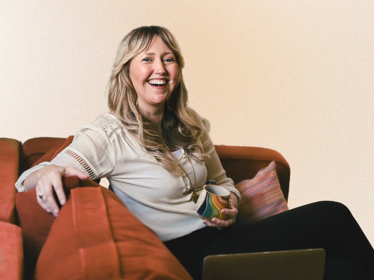 Sefora-on-couch-smiling