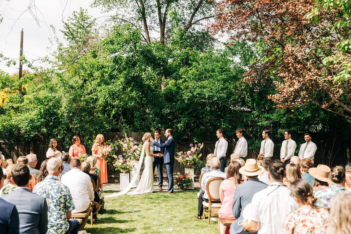 A backyard wedding ceremony planned by Perfect Thirds and Co. 
