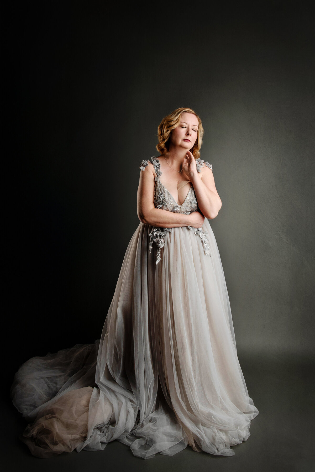 st-louis-family-photographer-just-mom-in-large-tulle-gray-gown-with-dramitic-light