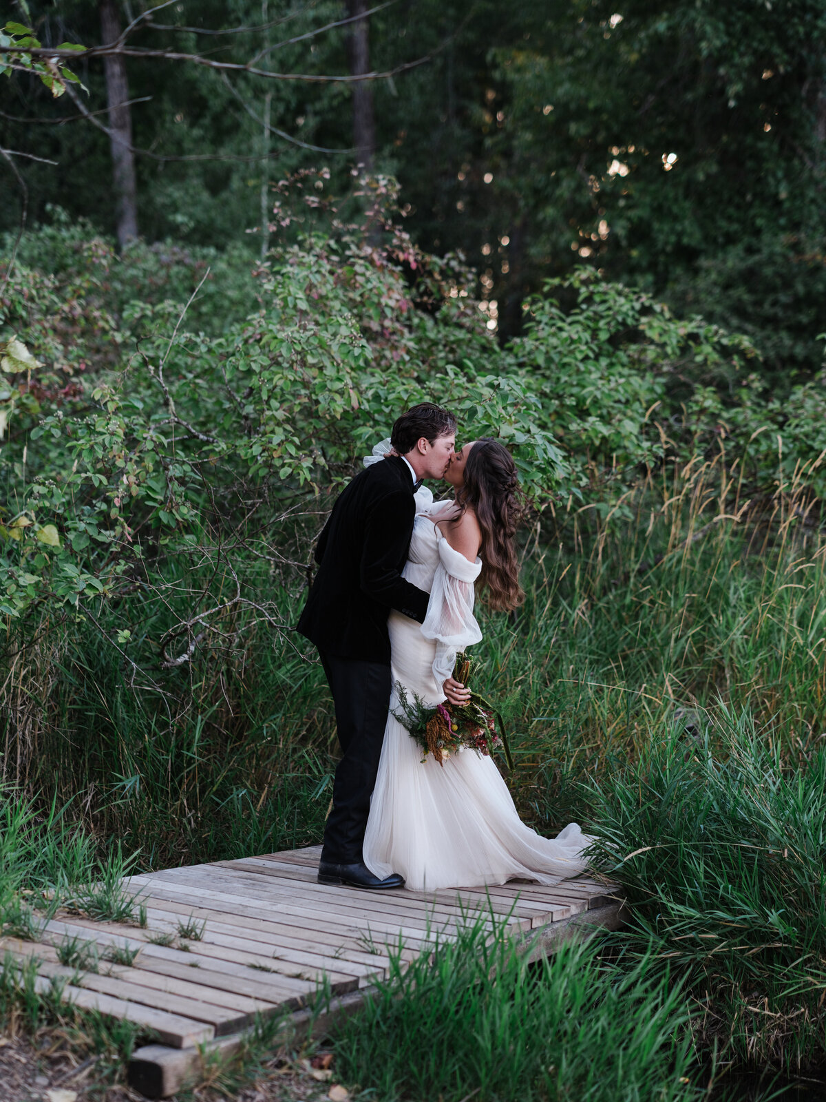 bride and groom kissing