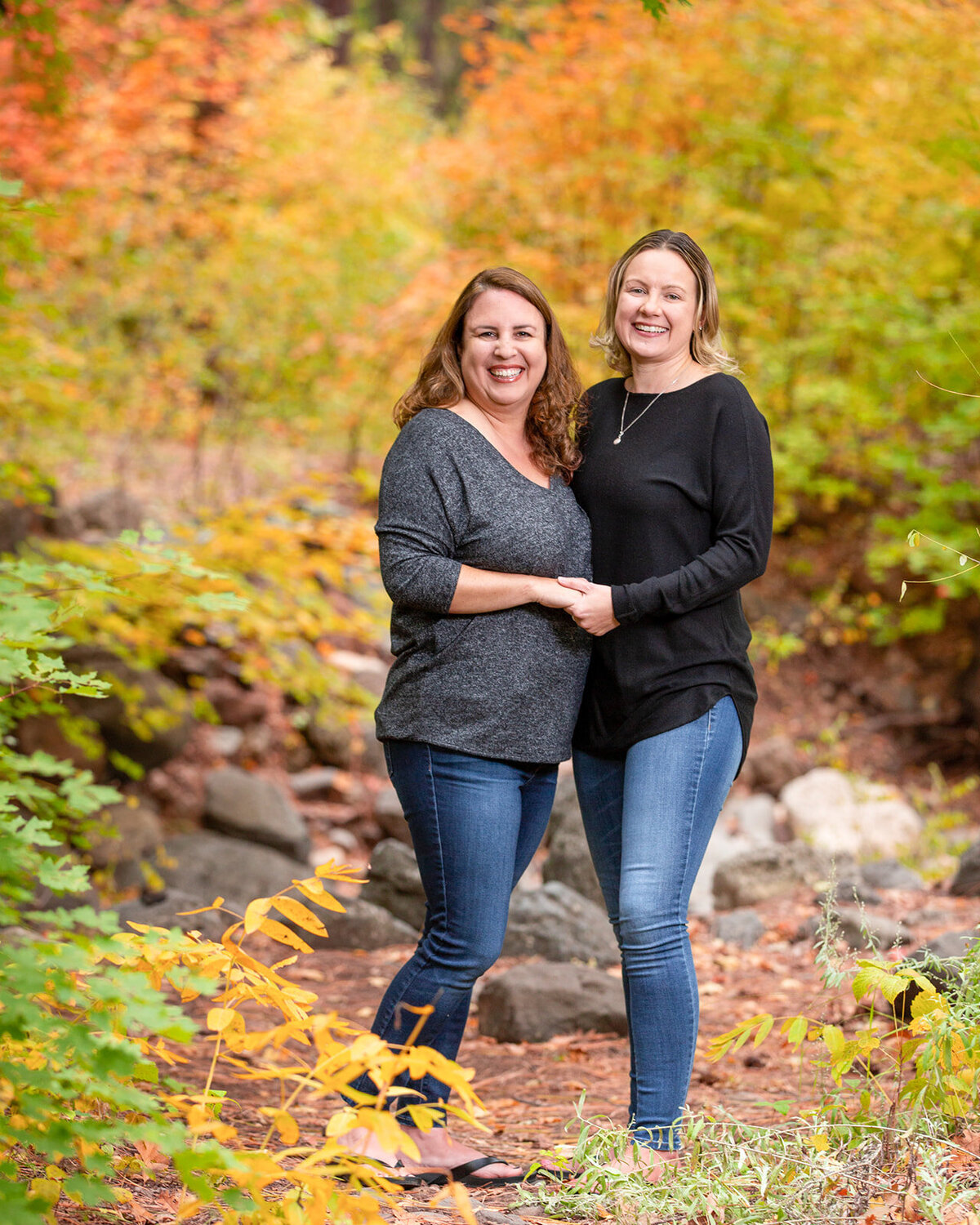 Fall color same sex wedding photo by DePoy Studios. Sedona's best same sex wedding photographers.