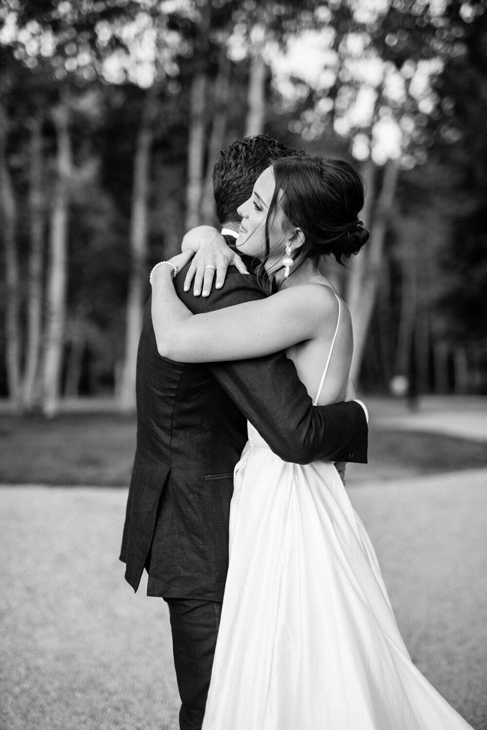 Bride and groom hugging each other at a Colorado wedding
