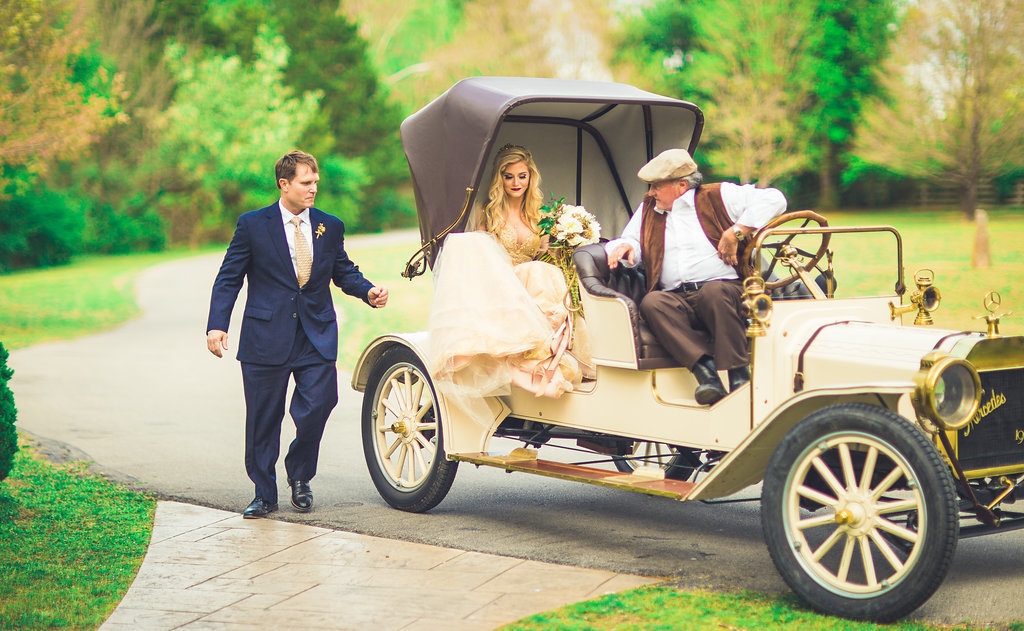 Wedding Photograph Of Groom Assisting His Bride in the Wedding Vehicle Los Angeles