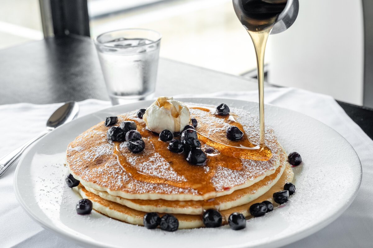 Blueberry pancakes with maple syrup from Marco's Grill and Deli on Maui, Hawaii. 