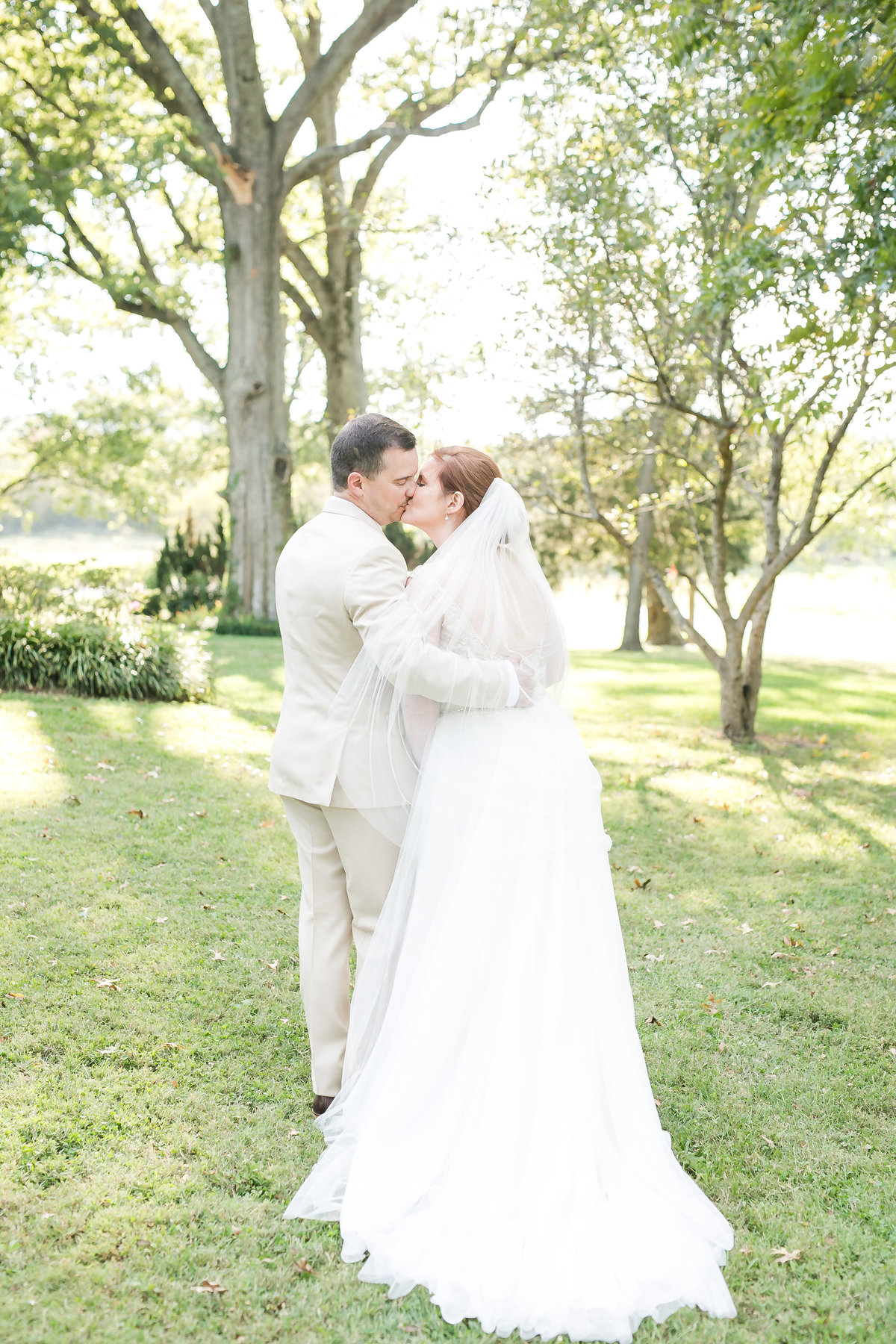 bride and groom kissing