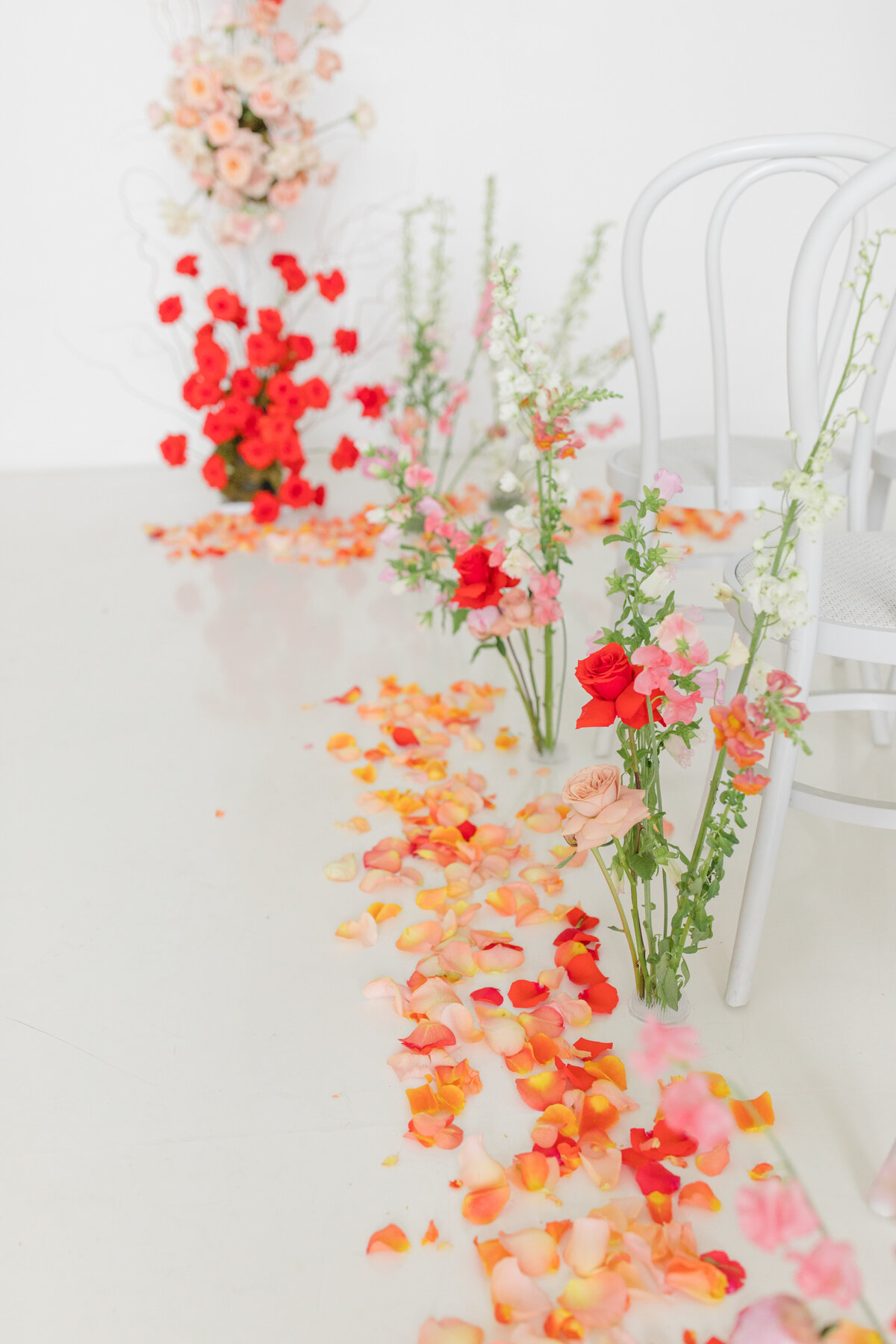 bright colored florals  in red, orange and pink