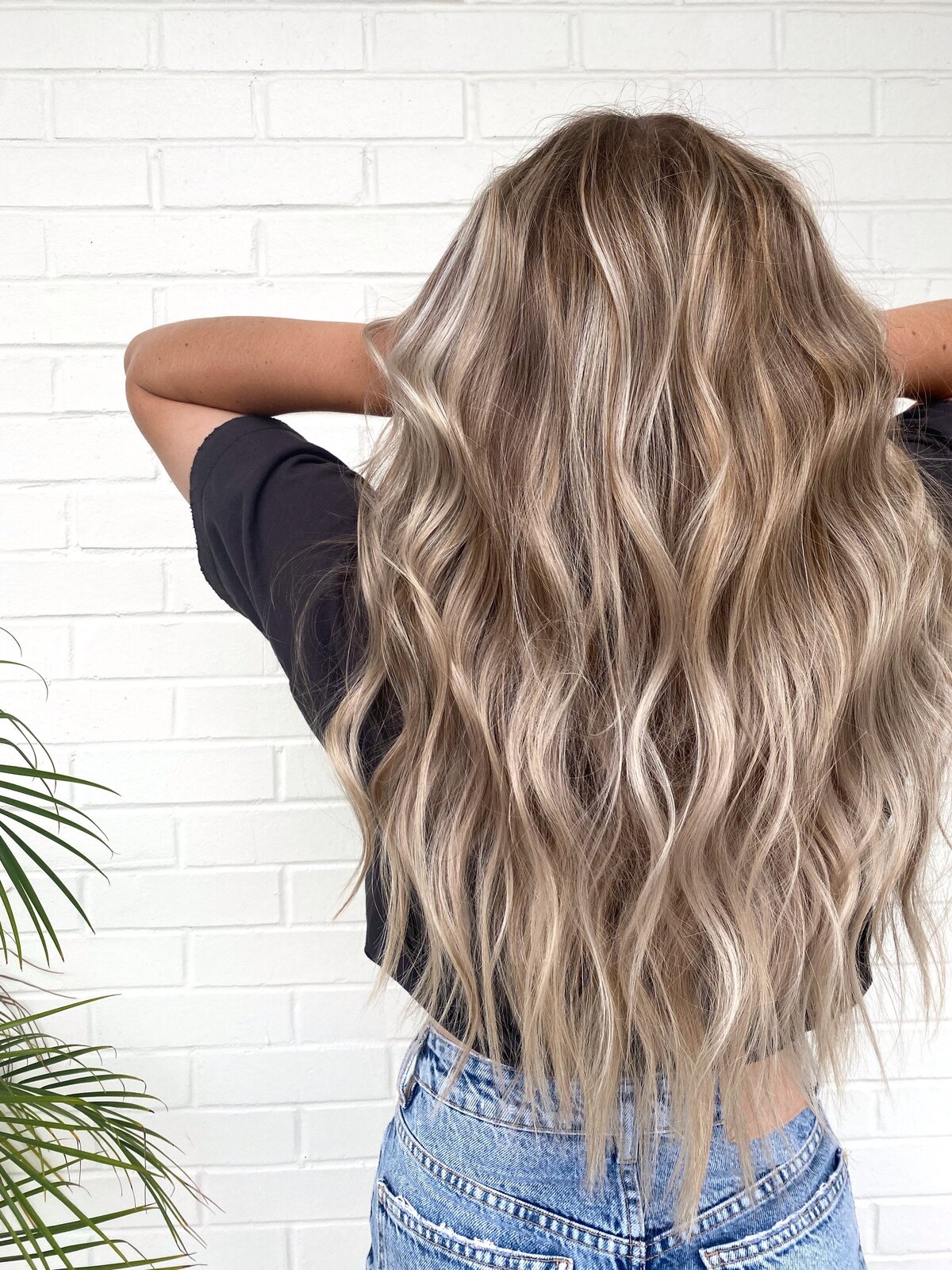 Warm natural blond color work courtesy of the colorists at Moxie by KC