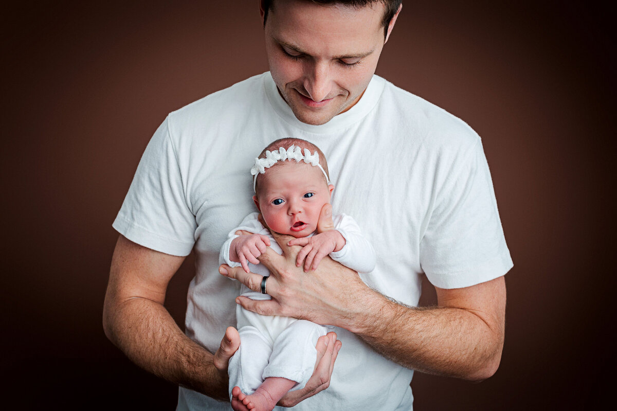 pittsburgh family newborn photographer studio dad holding little girl