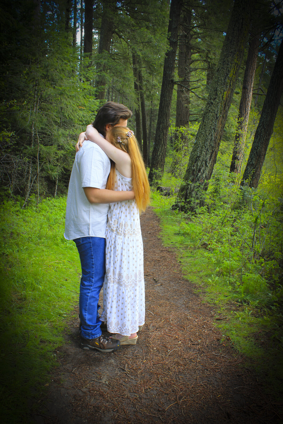 Newly Engaged Couple in Forest