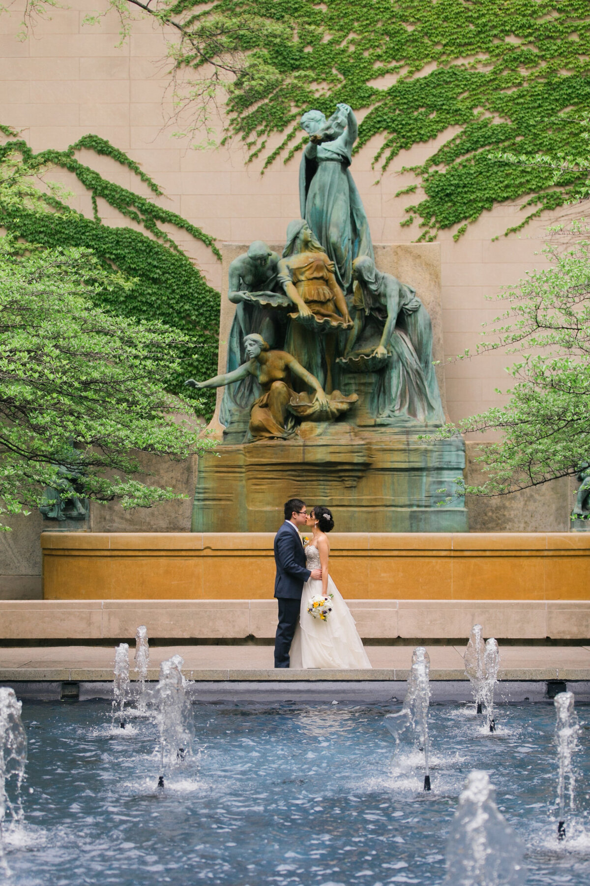 A wedding portrait taken in the South Garden of the Art Institute of Chicago