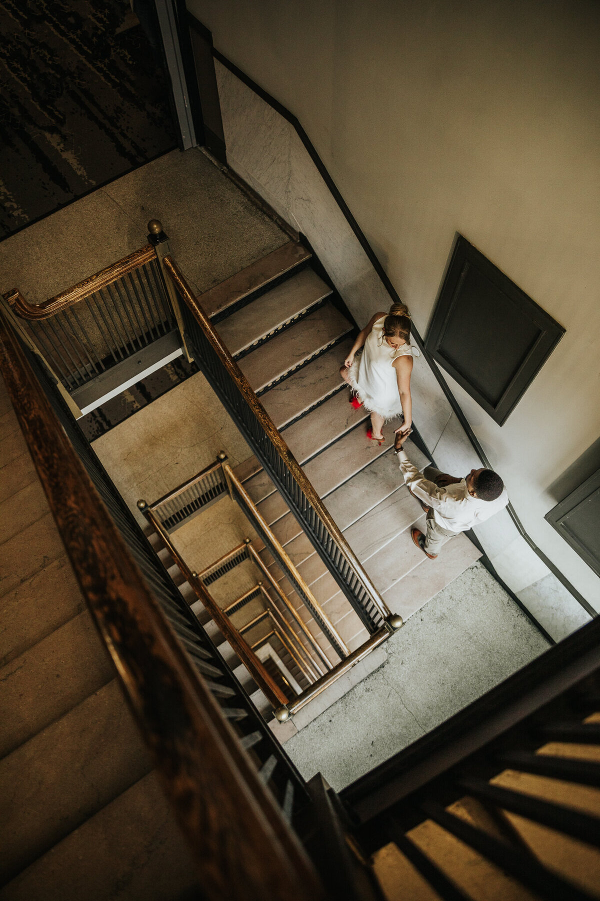 Fancy hotel elopement in a beautiful staircase