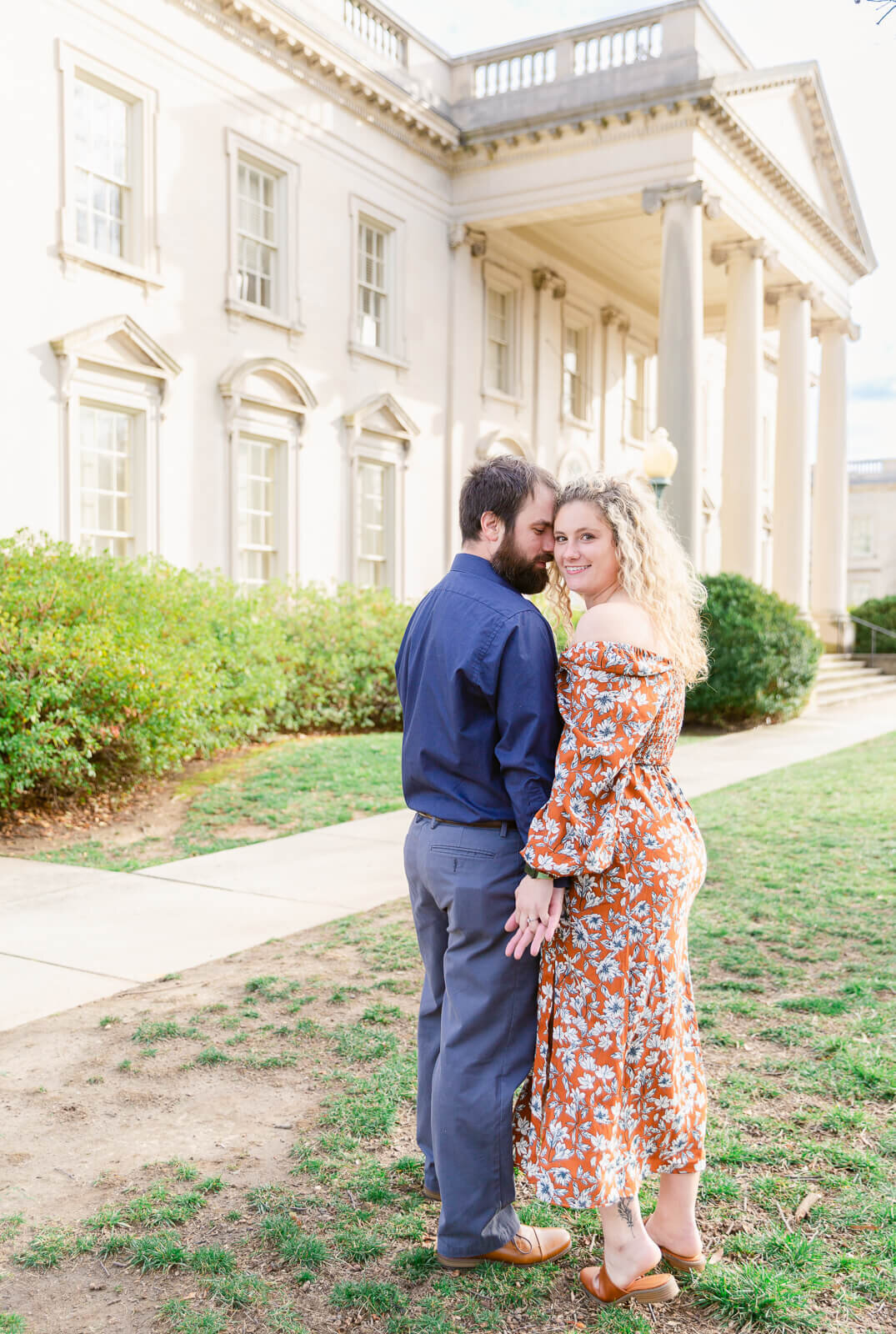 Engaged Couple taking portraits at the Virginia Museum of Fine Arts in Richmond, Virginia. Taken by Bethany Aubre Photography.