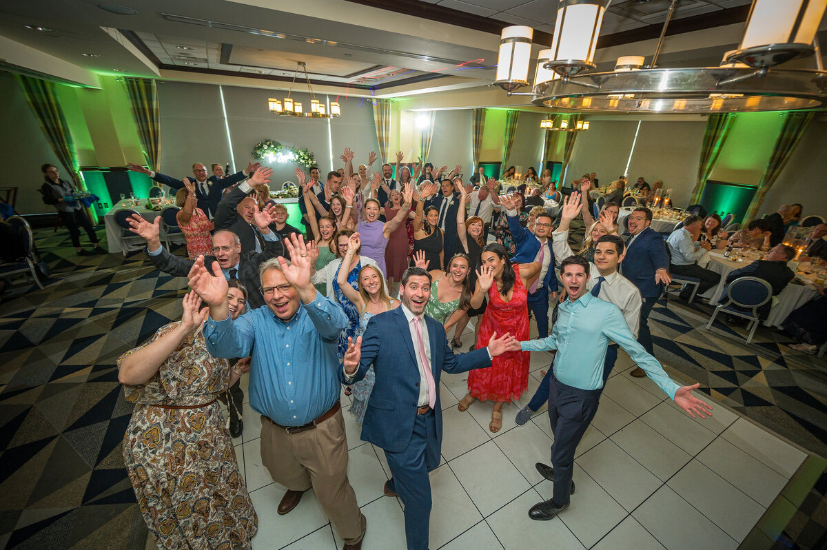 Wedding guests dancing during reception at Sheraton Erie Bayfront.