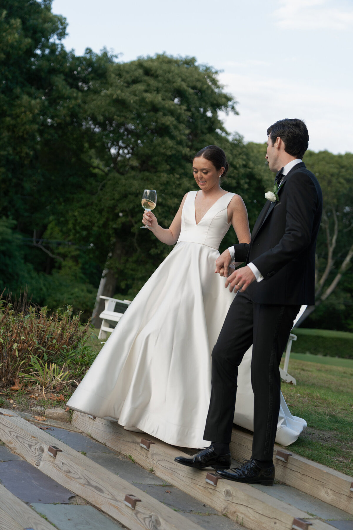 Couple walking down stairs taken by film wedding photographer shelby ann photos