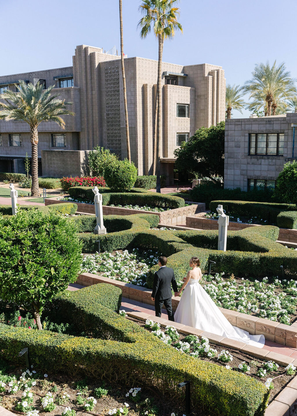 bride-groom-walking-garden-path-biltmore.